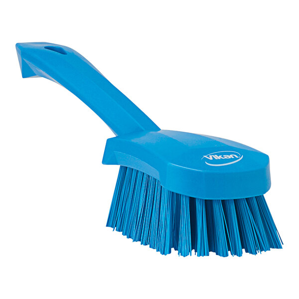 A blue Vikan washing brush with a handle.