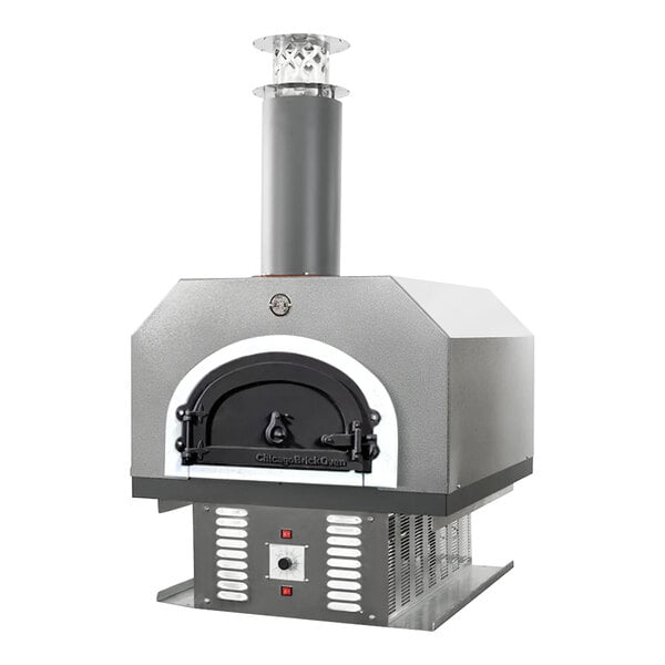 A grey Chicago Brick Oven countertop pizza oven with a chimney.