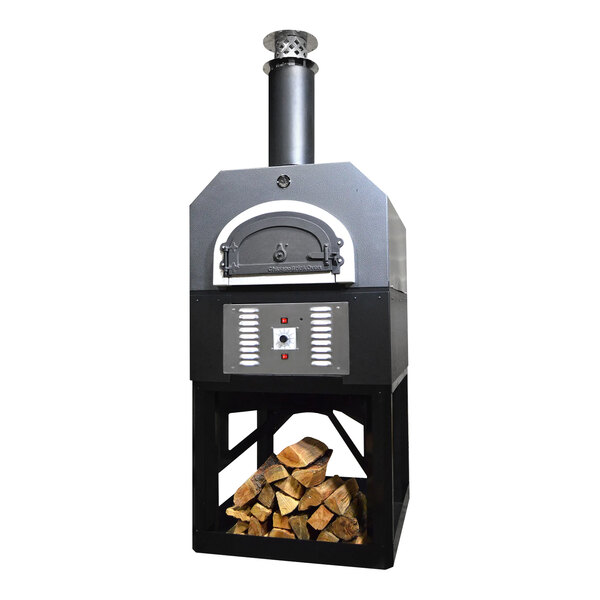 A Chicago Brick Oven silver vein hybrid wood and natural gas-fired outdoor pizza oven with a chimney.