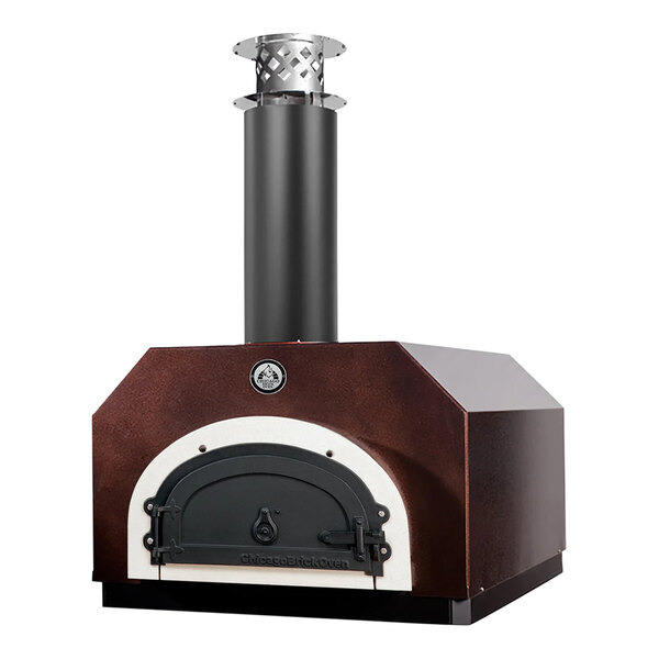 A Chicago Brick Oven wood-fired countertop pizza oven with a copper vein finish.