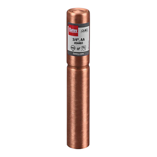 A copper tube with a red label on it.