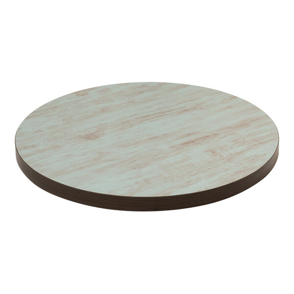 An American Tables & Seating round laminate table top with a blue wood grain finish.