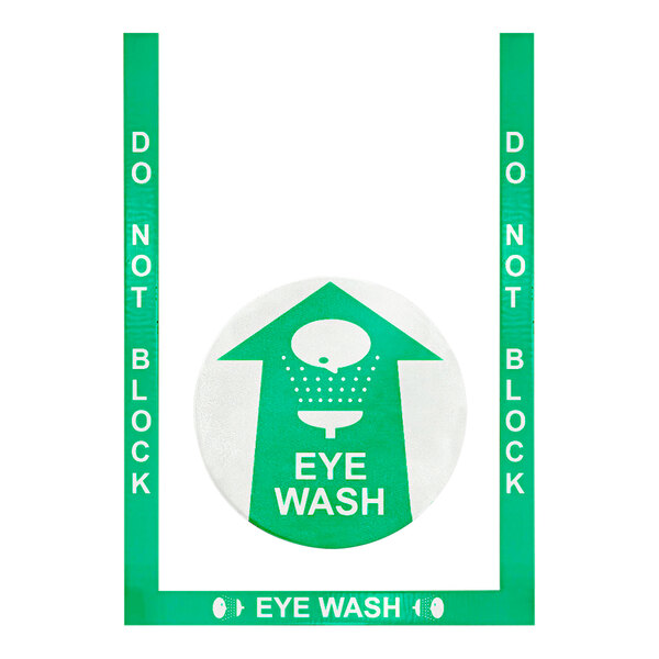 A green and white rubber floor sign that says "Do Not Block Eye Wash"