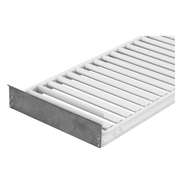 A white metal shelf with metal slats.
