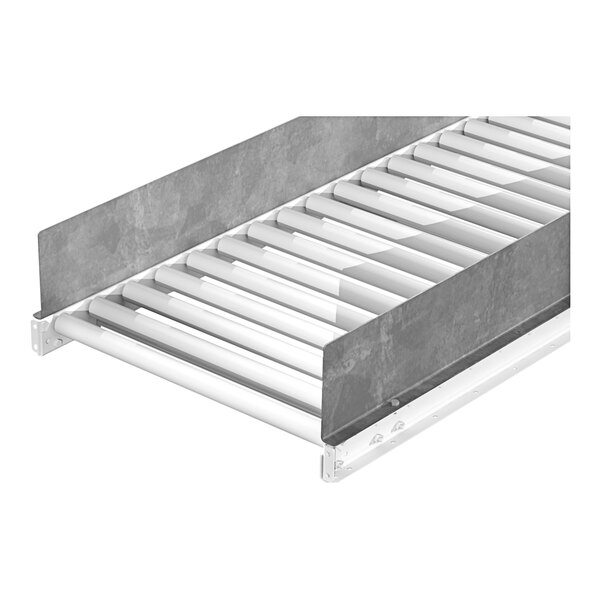A metal side guide for a roller conveyor.