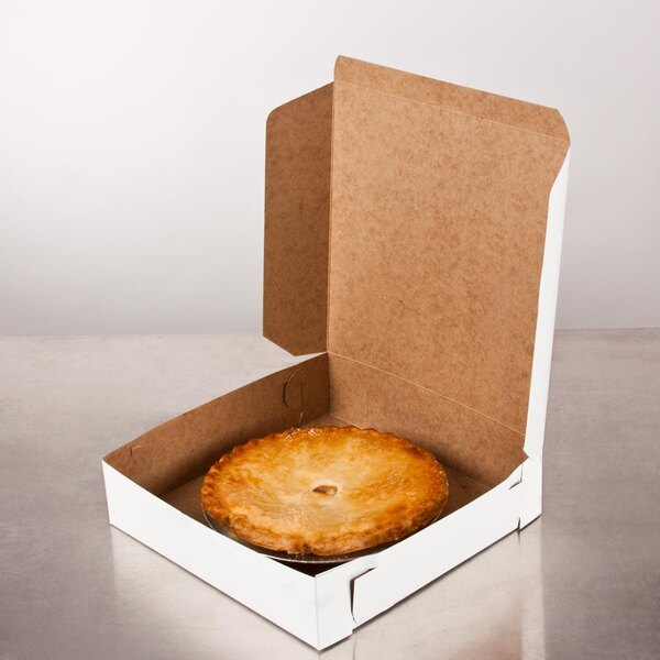 A white customizable pie box with a pie inside.