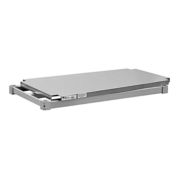 A rectangular grey metal New Age shelf with a white label.
