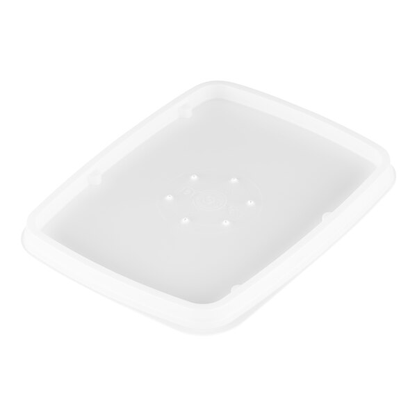 A white plastic rectangular lid with circles and dots.