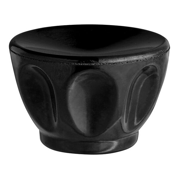 A black round Bakelite knob.
