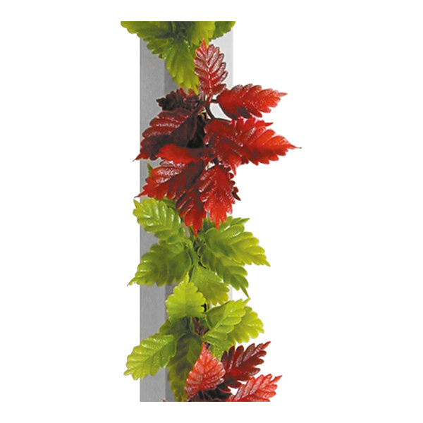 A Dalebrook white display divider with red and green artificial Coleus leaves.