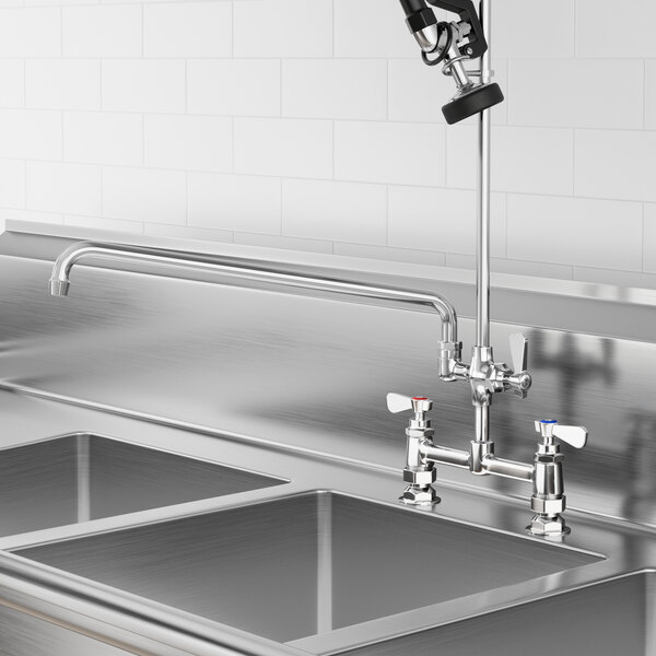 A Regency add-on faucet with 18" swing spout over a sink in a professional kitchen.
