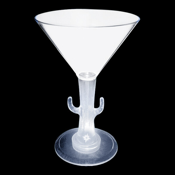 A clear plastic martini cup with a cactus shaped stem on a white background.