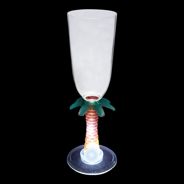 A customizable plastic champagne cup with a palm tree stem and white LED light.