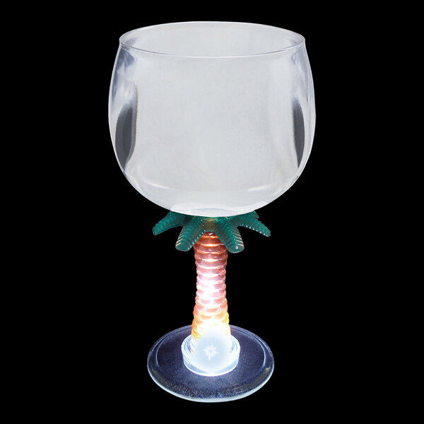 A customizable plastic palm tree stem goblet with a white LED light on it.