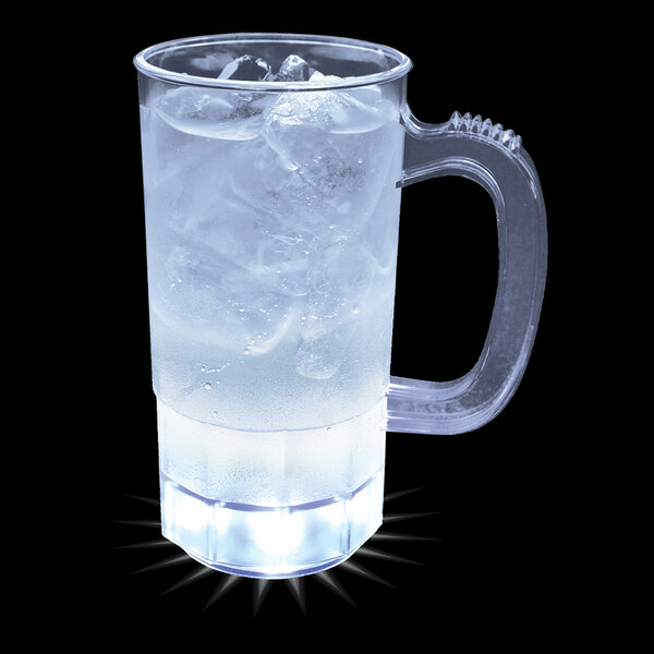 A clear plastic fluted mug with ice and liquid in it and white LED lights.