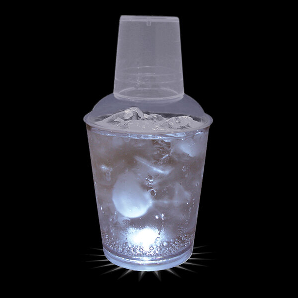 A customizable plastic cup with a clear lid and ice inside it with a white LED light.