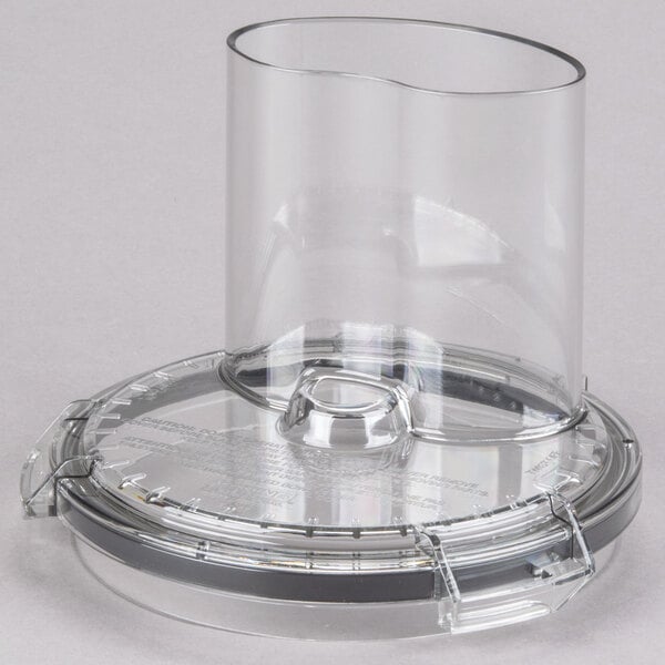 A clear plastic Waring bowl cover with a clear lid on top.