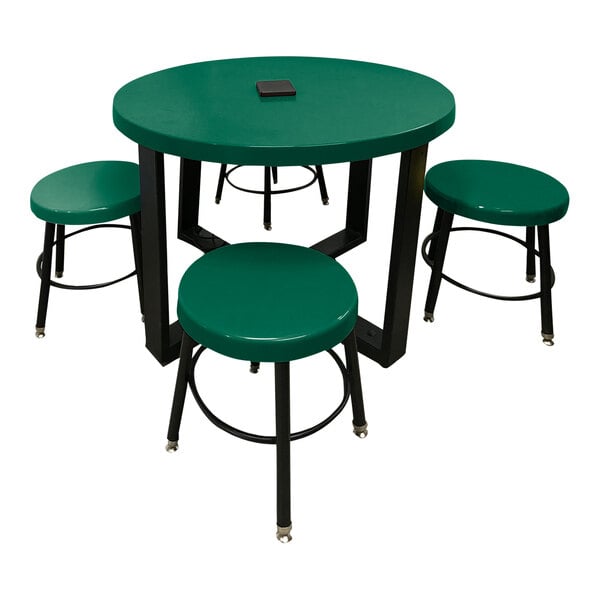A Sol-O-Matic hunter green fiberglass table with four stools around it.