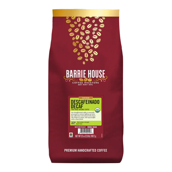 A red bag of Barrie House Fair Trade Organic Descafeinado decaf whole bean coffee.