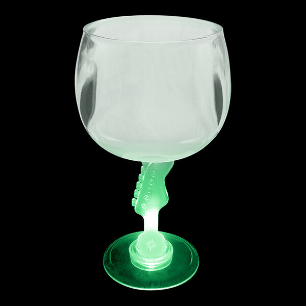 A close-up of a 12 oz. plastic guitar stem goblet with a green stem and LED light.