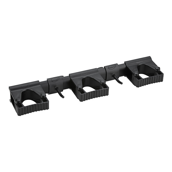 A black plastic Vikan wall bracket system.