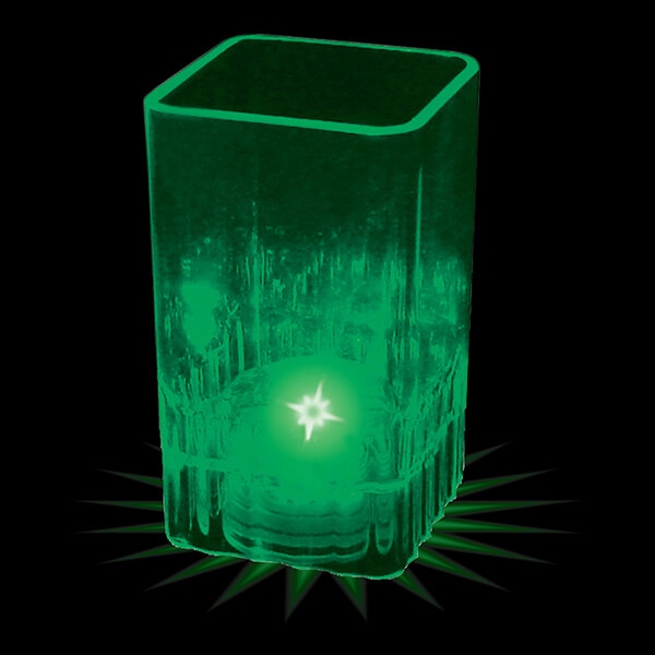 A green plastic square shot cup with a green LED light inside.