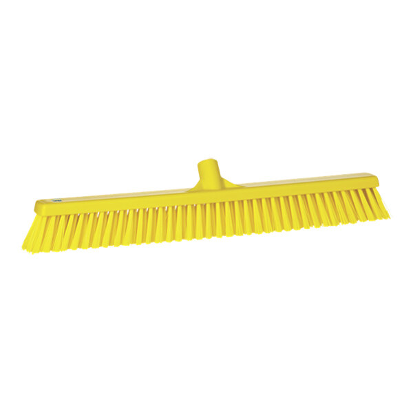 A yellow Vikan push broom head.