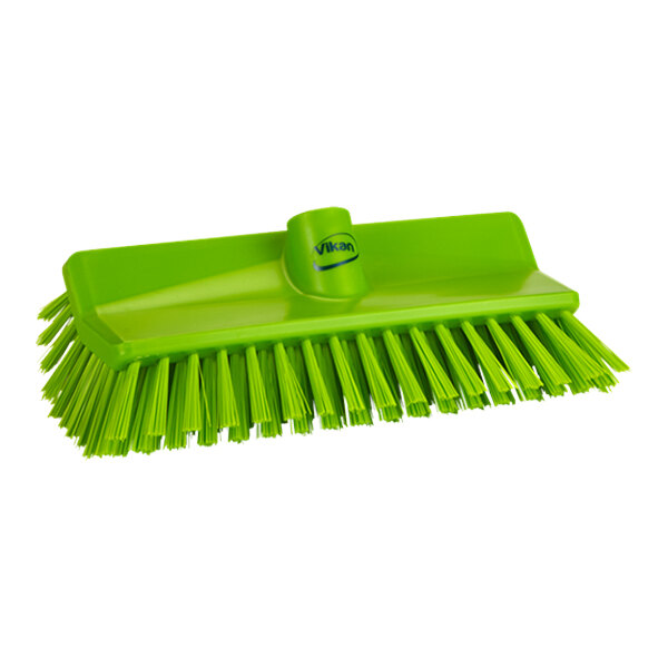 A green Vikan deck brush head with medium stiff bristles.
