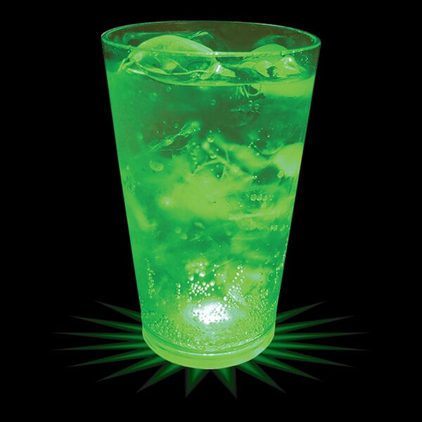 A 16 oz customizable plastic pint cup with a green drink and ice, with a green LED light.
