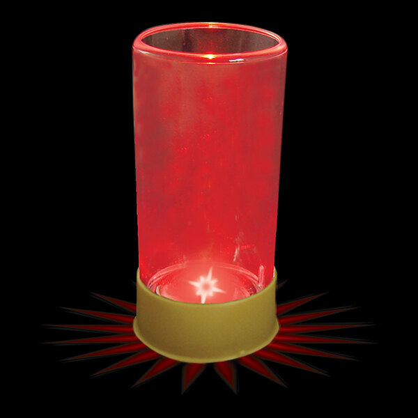 A red plastic shot cup with a red LED light inside.