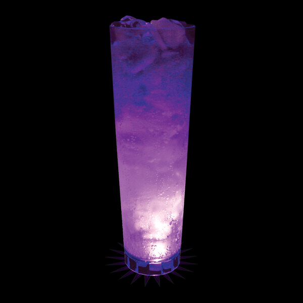 A 32 oz. plastic cup with a purple LED light filled with a purple drink and ice.