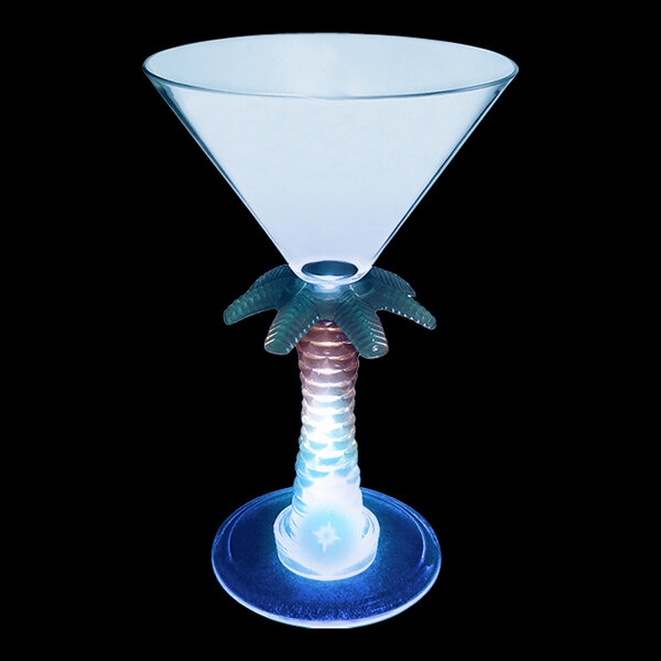 A clear plastic martini glass with a palm tree stem and a blue LED light.