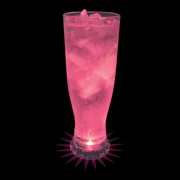 A customizable plastic pilsner cup filled with pink liquid and ice.