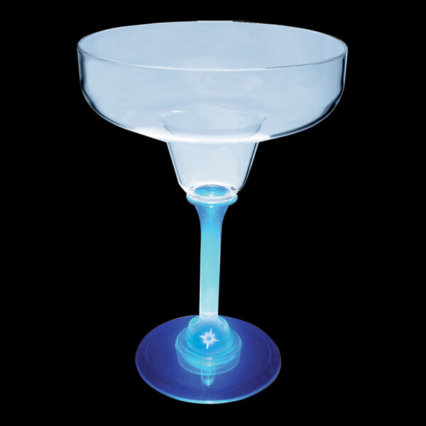 A clear plastic margarita cup with a blue stem.