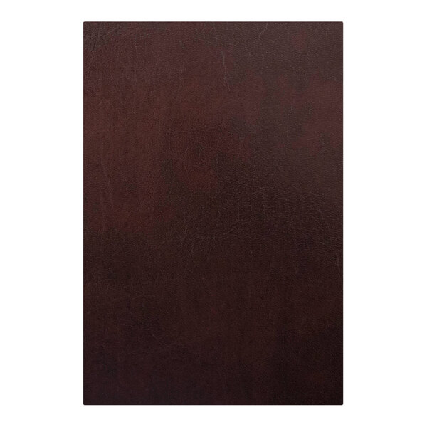 A brown leather H. Risch, Inc. Wine Tuxedo menu cover with picture corners.