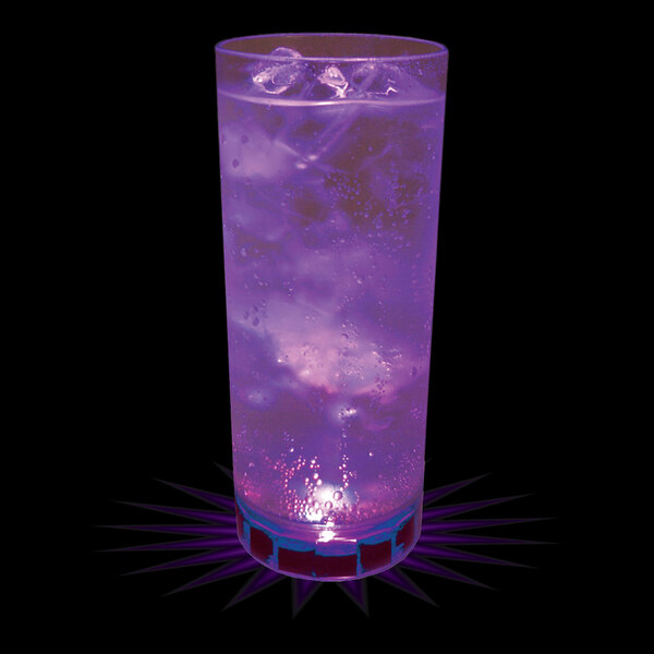 A clear plastic cup with purple liquid and ice with a purple LED light inside.