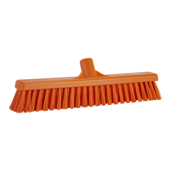 An orange Vikan push broom head.