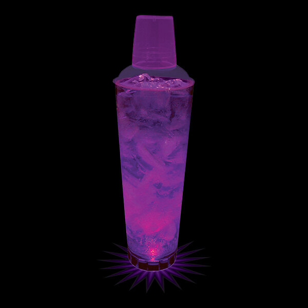 A purple drink in a 24 oz. plastic shaker with ice.