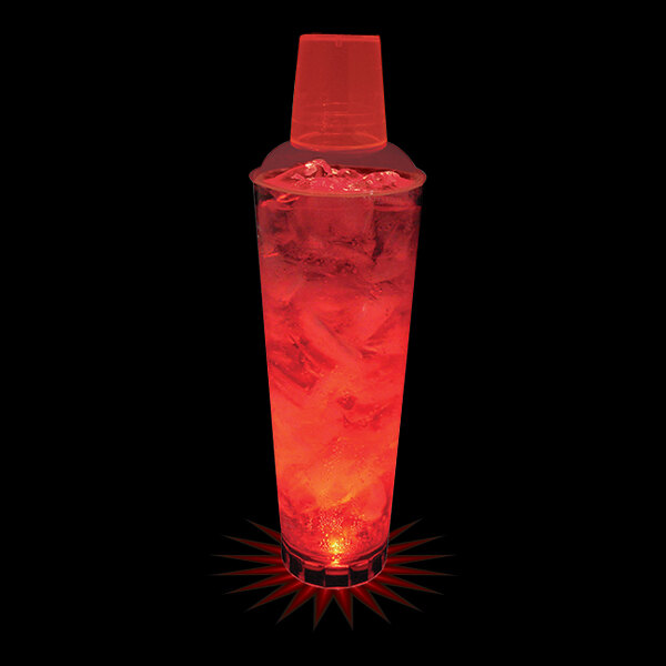 A customizable plastic cocktail shaker with a red LED light filled with a red drink.