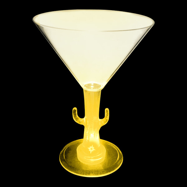 A yellow plastic cactus stem martini glass with a yellow LED light.