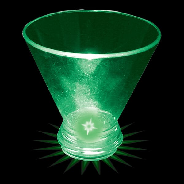 A customizable plastic stemless martini cup with a green light shining inside.