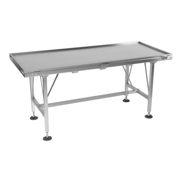 A Savage Bros stainless steel rectangular cooling/heating table with black rubber legs.
