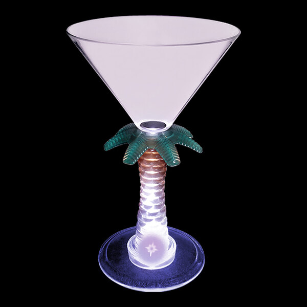A clear plastic martini glass with a palm tree stem and a purple LED light.