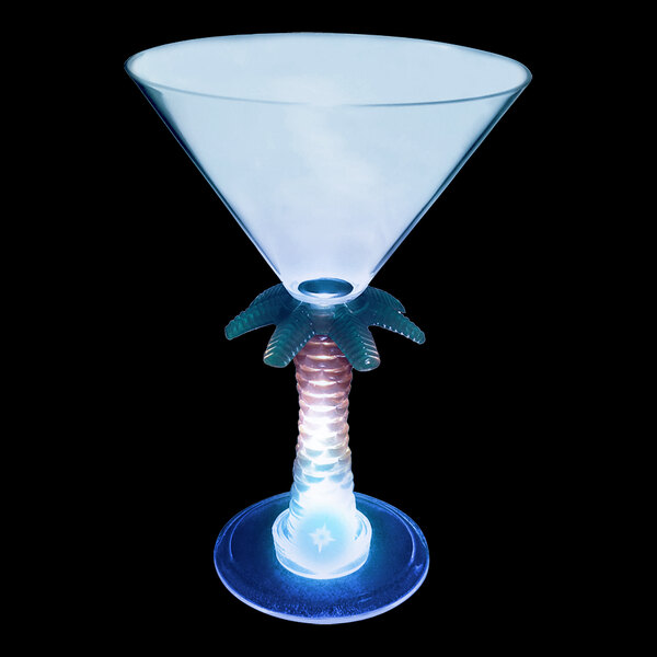 A clear plastic martini glass with a palm tree stem and a blue LED light.