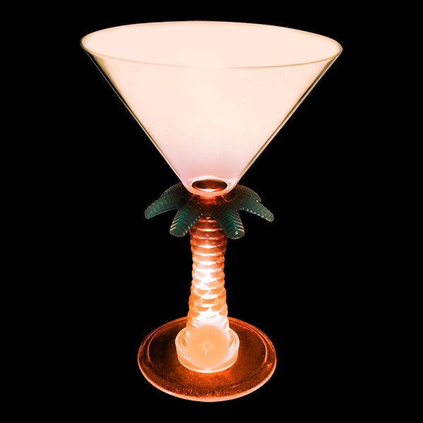 A customizable plastic martini glass with a palm tree stem and an orange LED light inside.