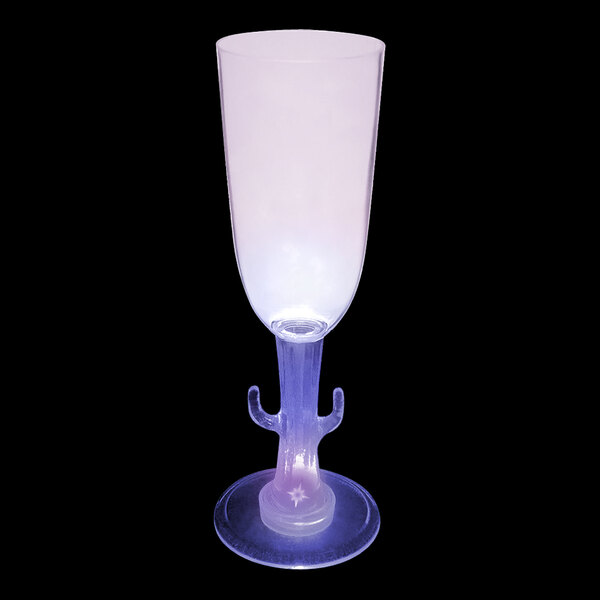 A clear plastic champagne cup with a cactus stem and purple LED light.