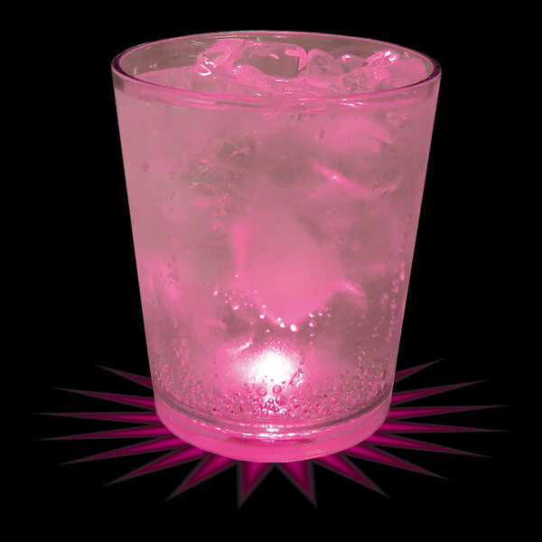 A customizable plastic rocks cup with ice and a pink LED light.
