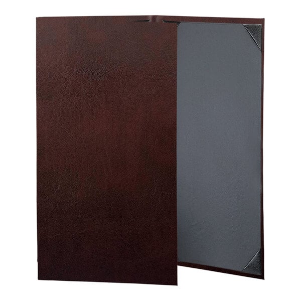 A brown leather H. Risch, Inc. menu cover with picture corners.