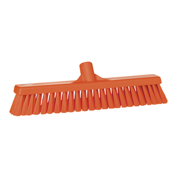 An orange Vikan push broom head with flagged bristles.