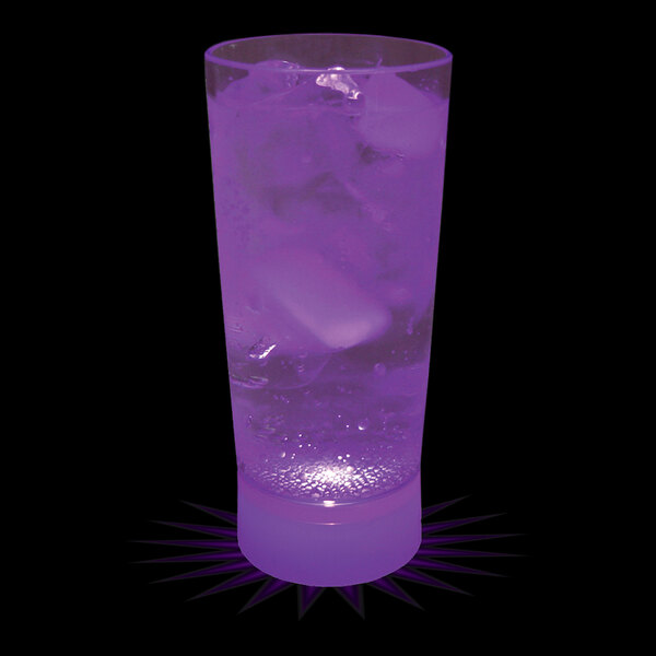 A close-up of a 10 oz. plastic cup with a purple LED light filled with a drink and ice.